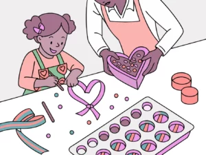 Enfant participant à un atelier DIY de confection de cœurs en chocolat encadré par un animateur lors d'une animation Fête des Mères en boutique